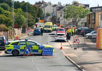 Police on scene as car and motoecycle involved in collision at Saltash