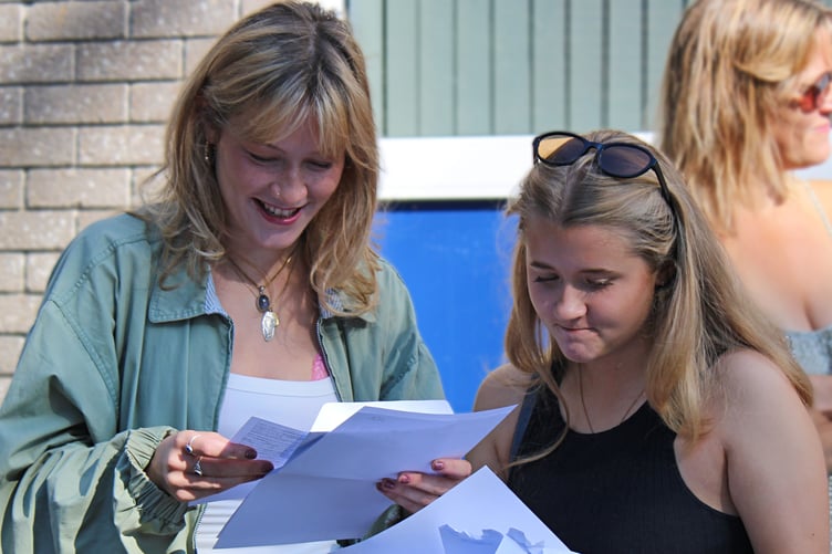 Students at Liskeard Community College take time to check out their A Level results