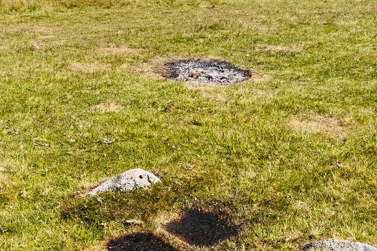 This picture shows where a fire and barbecues have been lit close to the Gold Diggings Quarry on Bodmin Moor