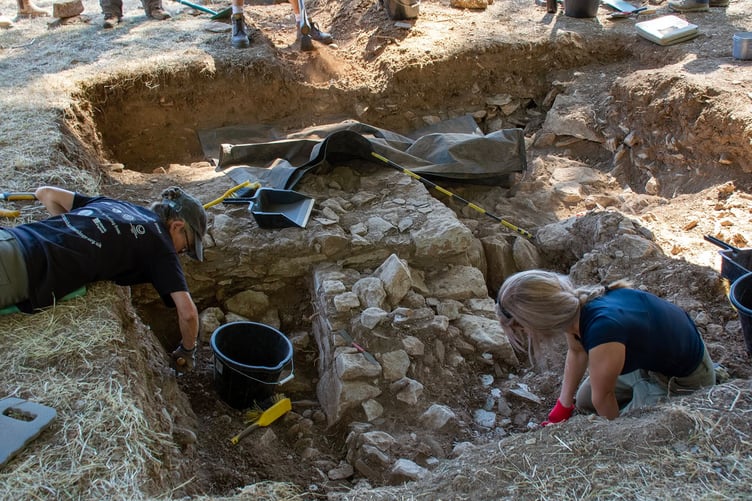 Medieval village walls uncovered at Mount Edgcumbe community dig.