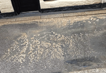 Sewage river floods busy Cornish high street