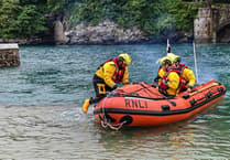 RNLI rescues woman cut off by tide near Looe