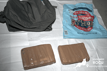 The bricks of cocaine were found in a special compartment under the front passenger seat of Woods' van