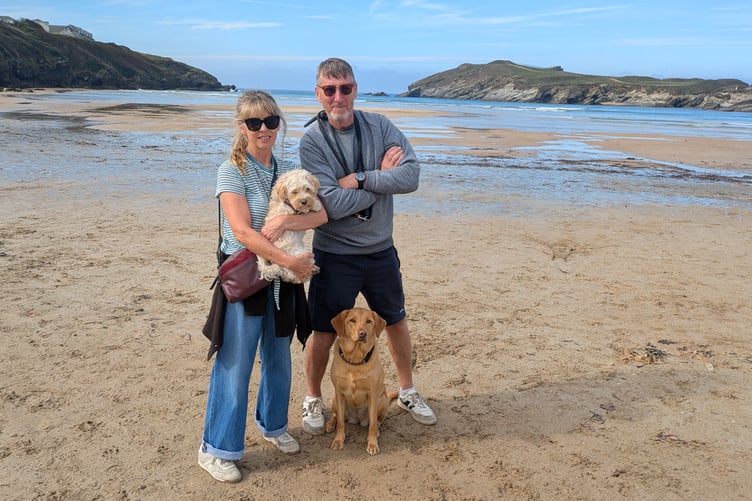 Holidaymakers James and Cyndi Speer from Suffolk fear the unspoilt nature of Porth Beach could change if the council leases it out (Picture: Warren Wilkins)