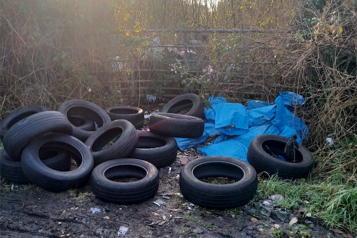 Tyres and tiles were dumped in Minorca Lane, Bugle. (Picture: Cornwall Council)