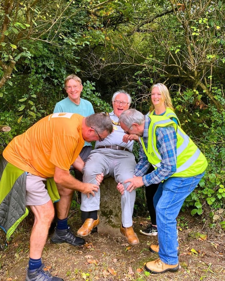Saltash mayor, Cllr Brian Stoyel, stops at one of boundary stones around the parish to take part in the traditional practice of “bouncing”