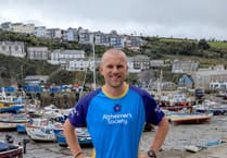Rugby player departs from Mevagissey at start of mammoth running challenge