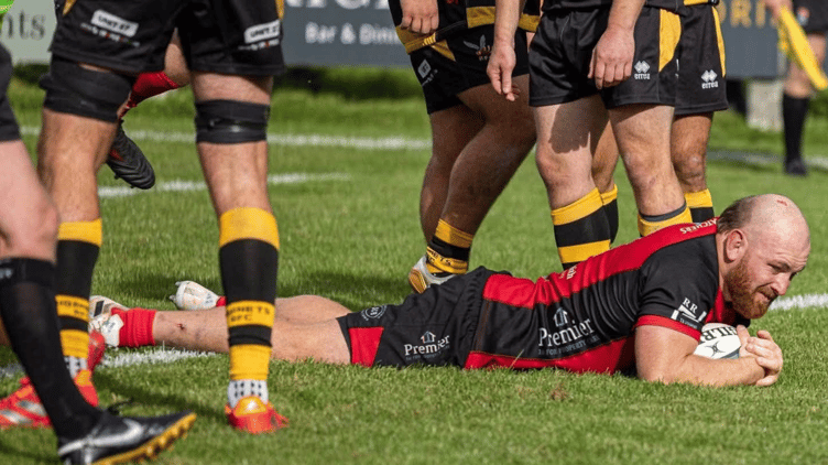 Tom Cowan-Dickie dotting down one of his three tries last Saturday.