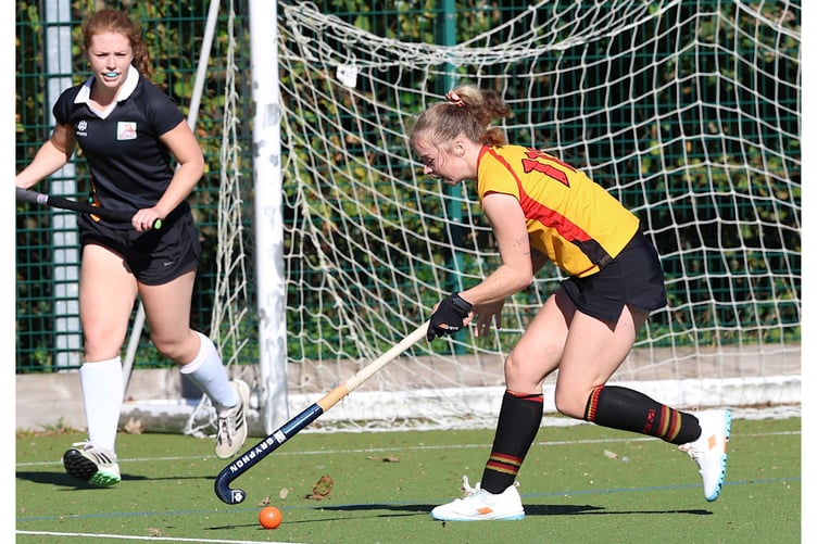 Emma Gliddon keeps close control.