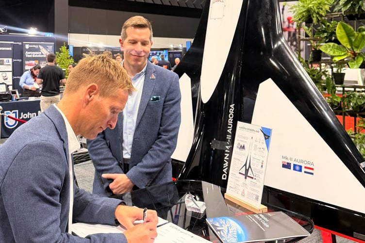 Ross Hulbert, head of engagement at Spaceport Cornwall, signing the memorandum of understanding