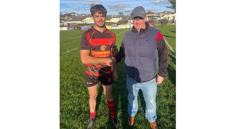 Alex Kendall was named as Liskeard-Looe's man-of-the-match and is pictured with the club's girls head coach, Stephen Rowe.