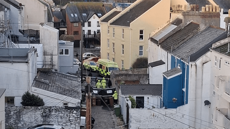 A cordon remains in place while forensic examinations and searches are carried out, with several road closures affecting the area, including Grand Parade and Garden Crescent