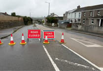 Redruth road closed after vehicle crashes into shop