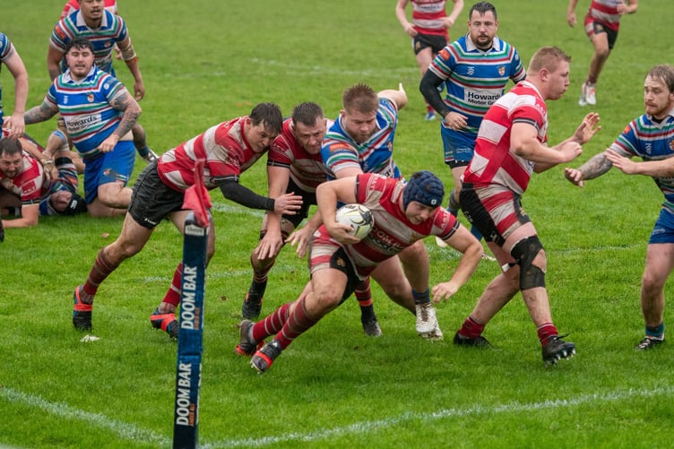 St Austell's star man on Saturday, Cam Taylor, dives over for their second try.